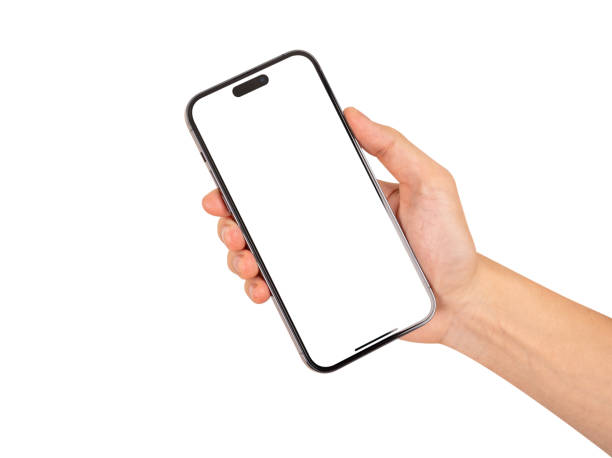 Hand holding smartphone with blank screen isolated on white background.